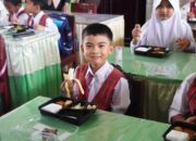 Kabupaten Dharmasraya Mulai Ujicoba Makan Siang Gratis Bagi Siswa di Sekolah