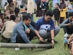 Keseruan Anak Gen Z Nikmati Permainan Tempo Dulu di Festival Pamenan Minangkabau II