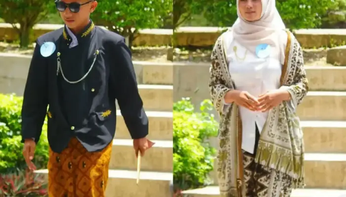 FOTO: Pesona Gadis dan Bujang Dharmasraya saat Lomba Hari Batik Nasional